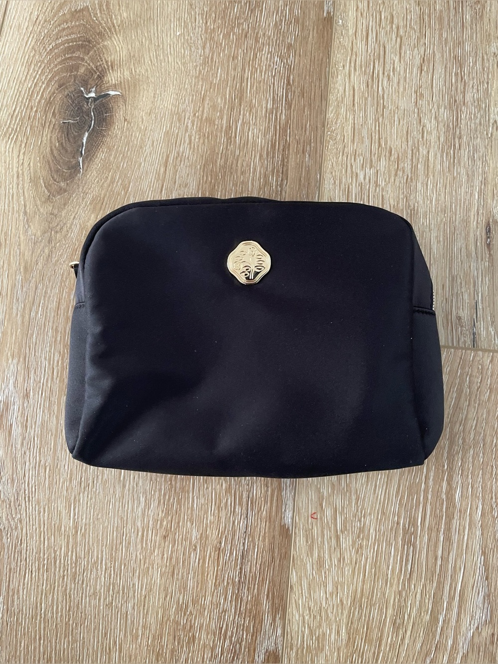 Shiseido black cosmetic bag with gold details